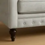 Classic_U-Shaped_Chesterfield_Sofa_with_Velvet_Upholstery_legs_closeup_view