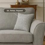 UK modern grey sofa close-up showing armrest and pillow