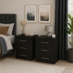 UK black bedside cabinets with three drawers in bedroom.