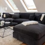 UK black corner sofa in modern living room.