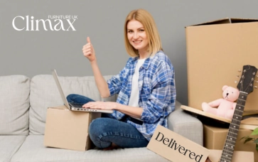 happy customer sitting on sofa in at home delivered on time - climax furniture